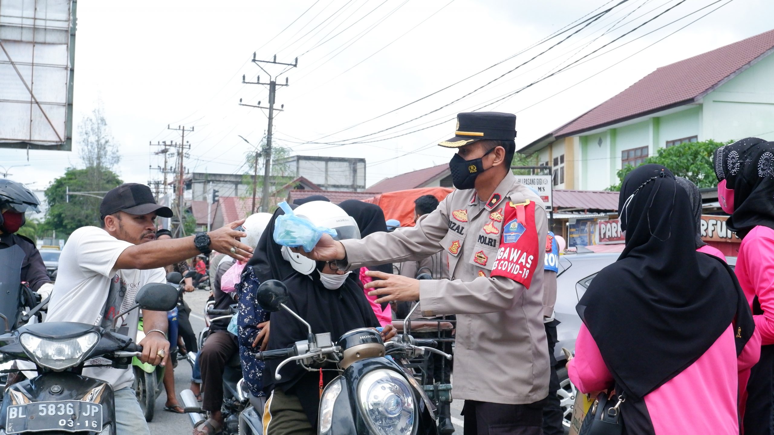 Polres Aceh Utara kembali menggelar Jum’at Berkah, Kini Di kota lhoksukon