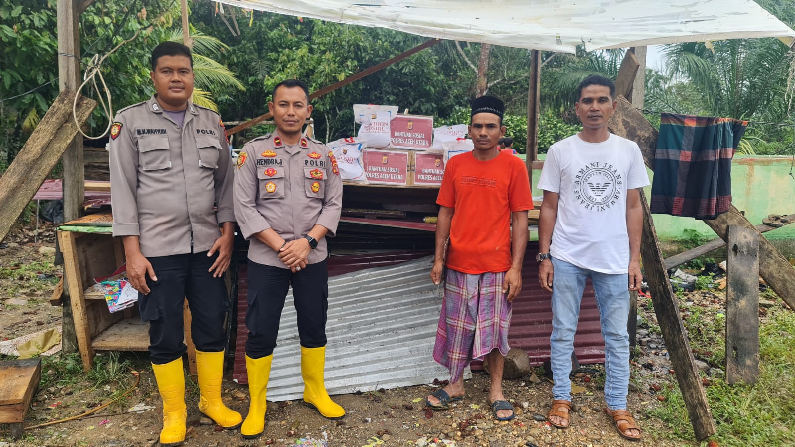 Kapolres Aceh Utara Beri Bantuan / Tali Asih Untuk Korban musibah Roboh Rumah